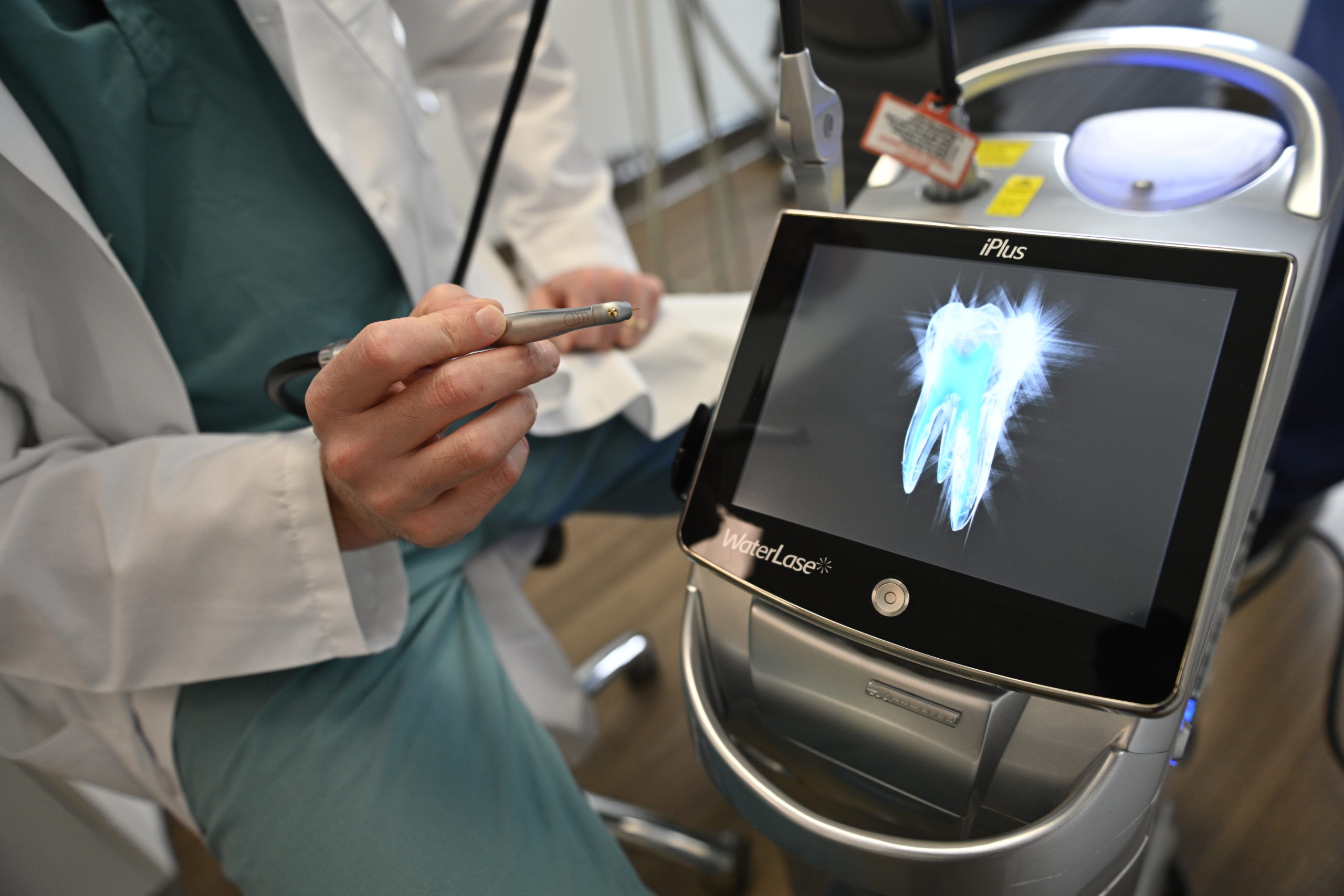 How does Laser dentistry help dental implants?